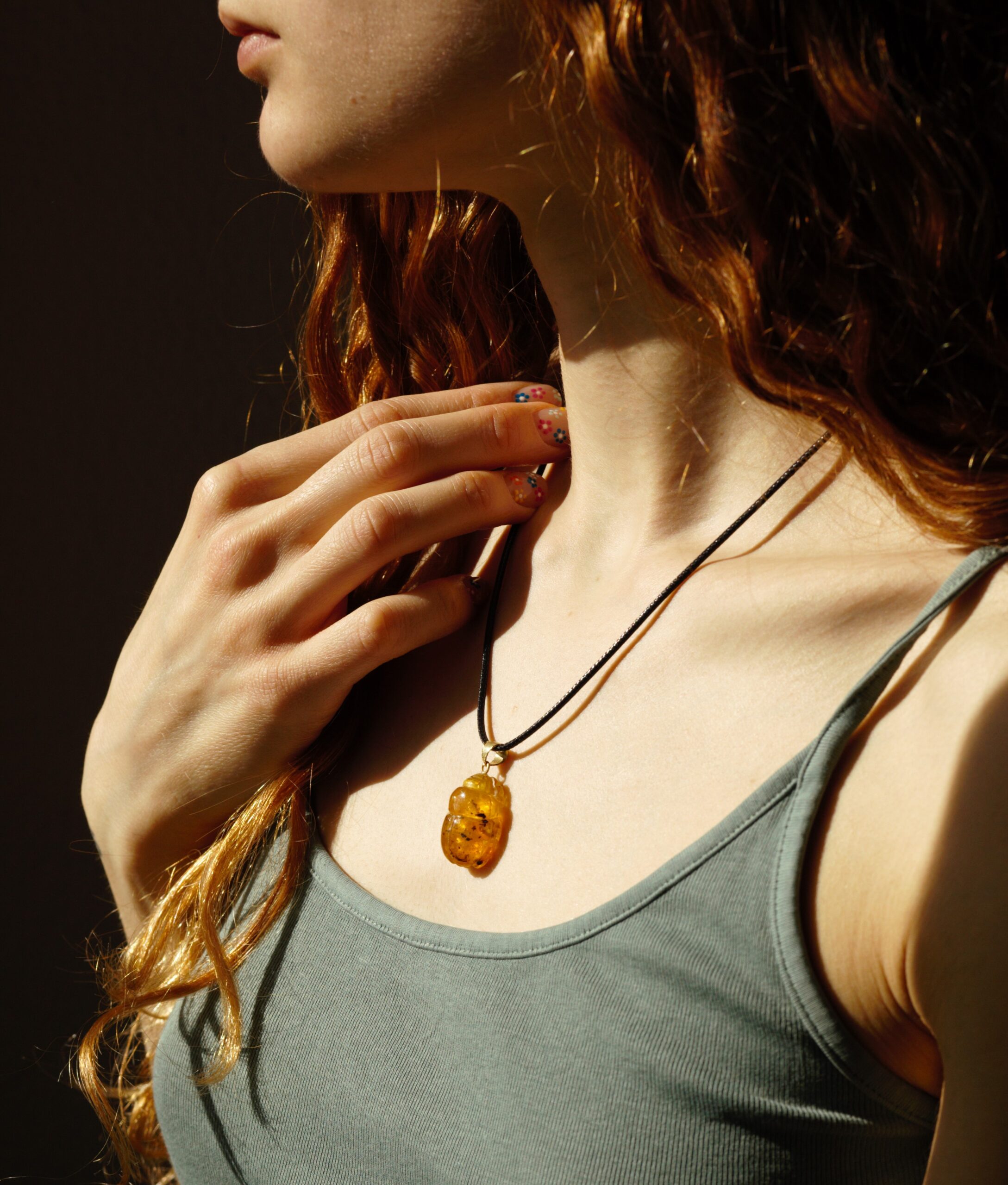 gold and amber pendant